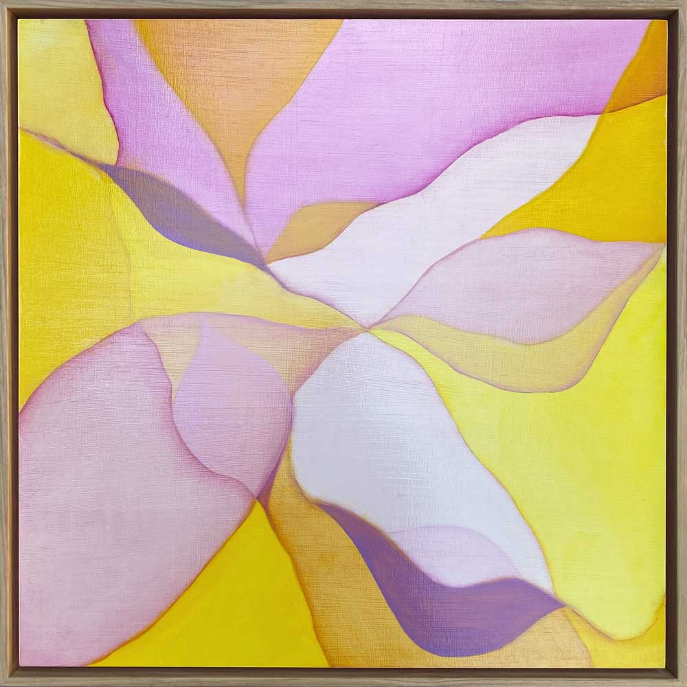 Luminous pinks and golds radiate from a point of intersection